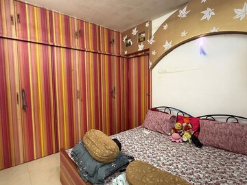 Bedroom in 2 BHK Apartment at Golden Chariot CHS, Lokhandwala Complex – for Rent