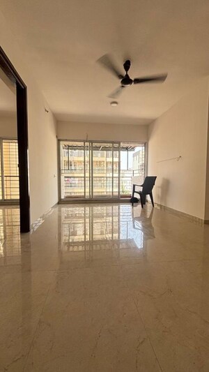 Living Room in 2 BHK Apartment at Ishwar Gracia, Nerul – for Rent