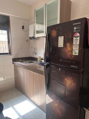 Kitchen in 2 BHK Apartment at Chandiwala Pearl Heaven, Andheri East – for Rent