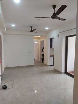Building Lobby in 2 BHK Apartment at Amrapali Golf Homes, Sector 4 Greater Noida – for Sale