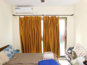 Bedroom in 2 BHK Apartment at Runwal Symphony, Santacruz East – for Rent