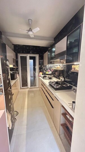 Kitchen in 2 BHK Apartment at Shree Tirupati STG Signature Residency, Thane West – for Rent