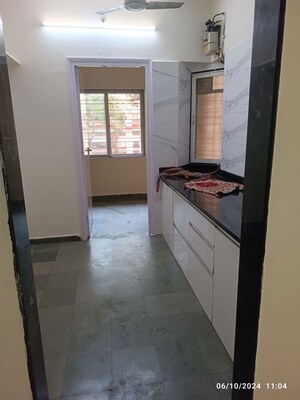 Kitchen in 1 BHK Apartment at Metropolis Bayside, Kasarvadavali – for Rent