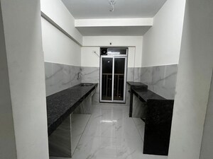 Building Lobby in 1 BHK Apartment at Metropolis Bayside, Kasarvadavali – for Rent