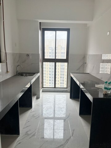 Kitchen in 2 BHK Apartment at Raymond Realty Phase II, Swastik Garden – for Sale