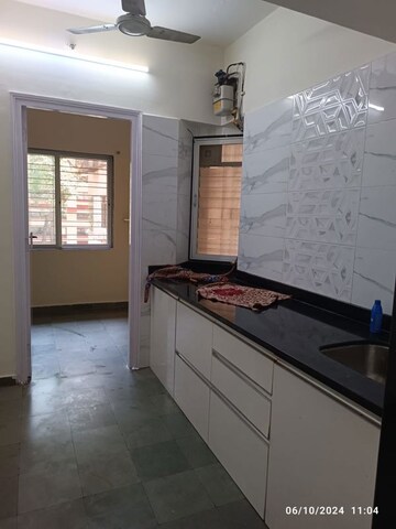 Kitchen in 1 BHK Apartment at Metropolis Bayside, Kasarvadavali – for Rent