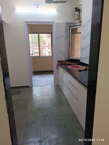 Kitchen in 1 BHK Apartment at Metropolis Bayside, Kasarvadavali – for Rent