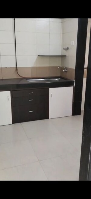 Kitchen in 2 BHK Apartment at Atul Blue Orbit, Malad West – for Rent