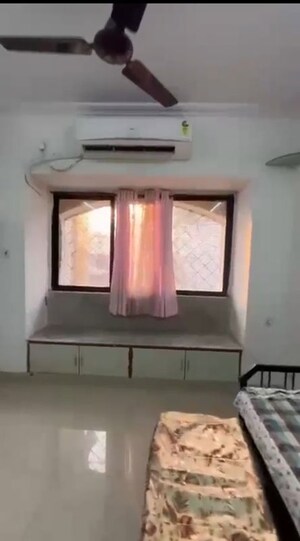 Room in 1 BHK Apartment at Satellite Garden, Goregaon East – for Rent