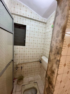 Bathroom in 3 BHK Builder Floor at Shantinagar CHS, Mira Road – for Rent