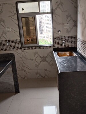 Kitchen in 1 BHK Apartment at DGS Sheetal Tapovan, Malad East – for Sale