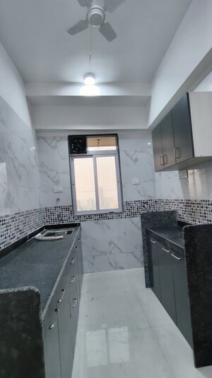 Kitchen in 1 BHK Apartment at DGS Sheetal Tapovan, Malad East – for Rent