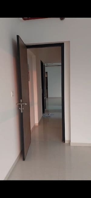 Room in 2 BHK Apartment at The Wadhwa Anmol Fortune, Goregaon West – for Rent