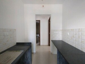 Kitchen in 1 BHK Apartment at Kalpataru Immensa, Kolshet Road – for Rent