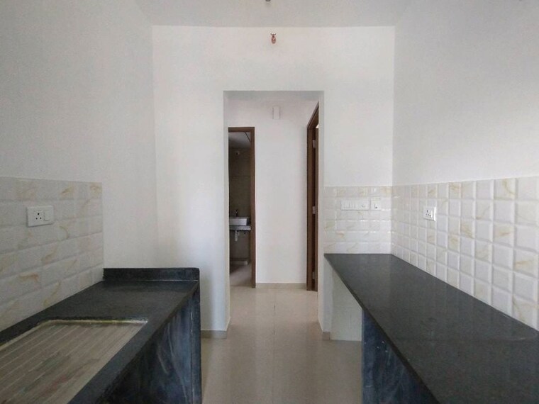 Kitchen, kalpataru-immensa 1 Bedroom 450 Sq.Ft. Apartment In Kolshet Road Thane 9939656
