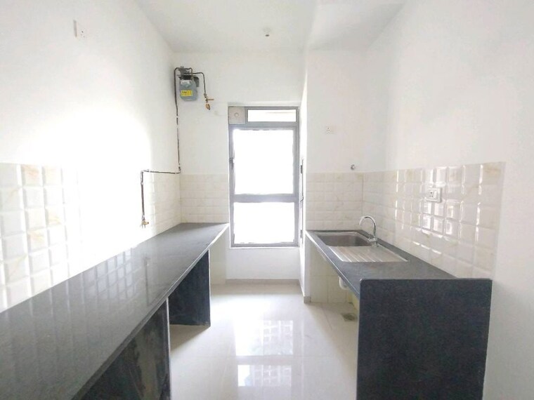 Kitchen, kalpataru-immensa 1 Bedroom 450 Sq.Ft. Apartment In Kolshet Road Thane 9939656