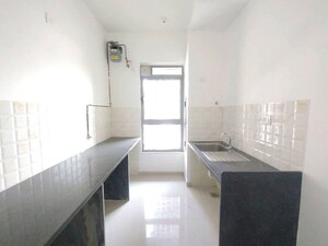 Kitchen in 1 BHK Apartment at Kalpataru Immensa, Kolshet Road – for Rent