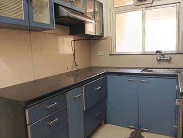 Kitchen in 2 BHK Apartment at Hiranandani Meadows, Manpada – for Rent
