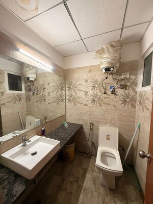 Bathroom in 1 BHK Apartment at Paramount Golfforeste, Zeta I Greater Noida – for Rent