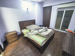Bedroom in 4 BHK Apartment at Mahagun Moderne, Sector 78 – for Rent