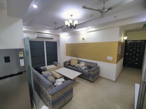 Living Room in 4 BHK Apartment at Mahagun Moderne, Sector 78 – for Rent