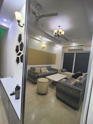 Living Room in 4 BHK Apartment at Mahagun Moderne, Sector 78 – for Rent