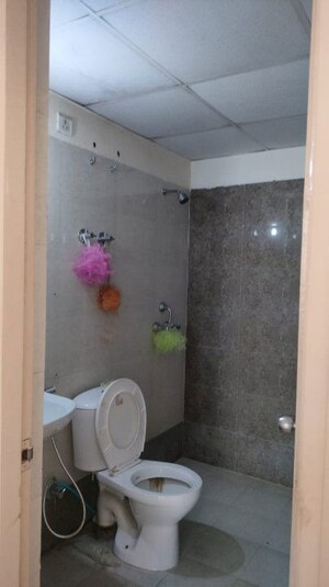 Bathroom in 2 BHK Apartment at MGI Gharaunda, Raj Nagar Extension – for Rent