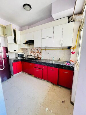 Kitchen in 2 BHK Apartment at MGI Gharaunda, Raj Nagar Extension – for Rent