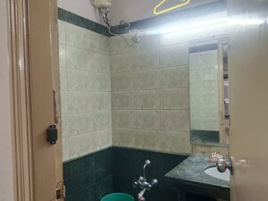 Bathroom in 3 BHK Apartment at Je and Vee Madhuban, Malad East – for Rent