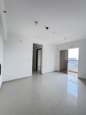 Living Room in 2 BHK Apartment at Lodha Codename Premier, Mangaon – for Sale