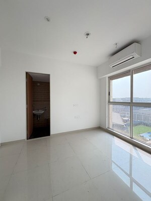 Master Bedroom in 2 BHK Apartment at Lodha Codename Premier, Mangaon – for Sale