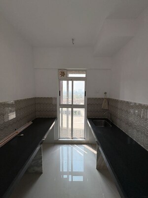 Kitchen in 2 BHK Apartment at Lodha Codename Premier, Mangaon – for Sale