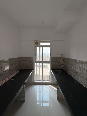 Kitchen in 2 BHK Apartment at Lodha Codename Premier, Mangaon – for Sale