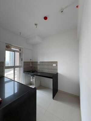 Kitchen in 2 BHK Apartment at Lodha Codename Premier, Mangaon – for Sale