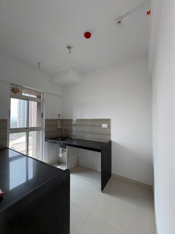 Kitchen in 2 BHK Apartment at Lodha Codename Premier, Mangaon – for Sale