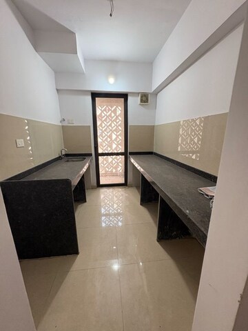 Kitchen in 2.5 BHK Apartment at Lodha Lakeshore Greens, Hedutane – for Rent