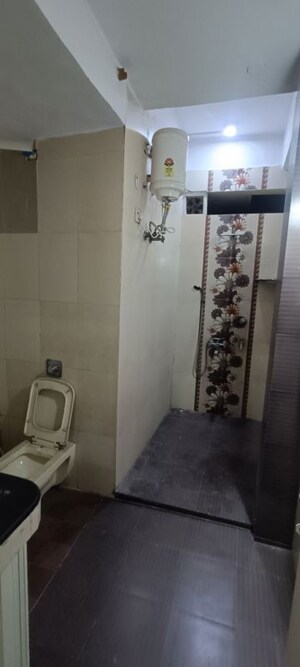 Bathroom in 3 BHK Builder Floor at Rohini Sector 8 – for Sale