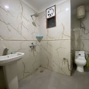 Bathroom in 2 BHK Builder Floor at Chattarpur – for Rent