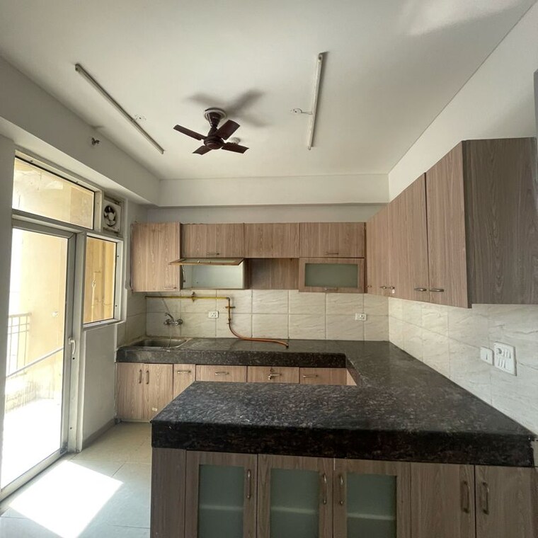 Kitchen, ajnara-homes-phase-2 4 Bedroom 1960 Sq.Ft. Apartment In Sector 16 Greater Noida Greater Noida 9940012