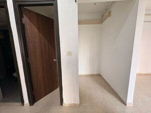 Building Lobby in 2 BHK Apartment at Lodha Lakeshore Greens, Hedutane – for Rent