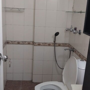 Bathroom in 2 BHK Apartment at Gundecha Marigold, Janupada – for Rent
