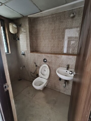 Bathroom in 1.5 BHK Apartment at Lodha Lakeshore Greens, Dombivli East – for Rent