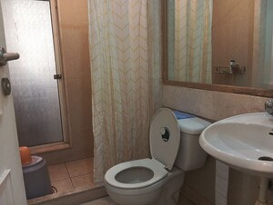 Bathroom in 1 BHK Apartment at Hiranandani Meadows, Manpada – for Rent