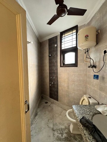 Bathroom in 2 BHK Builder Floor at Nehru Enclave – for Rent