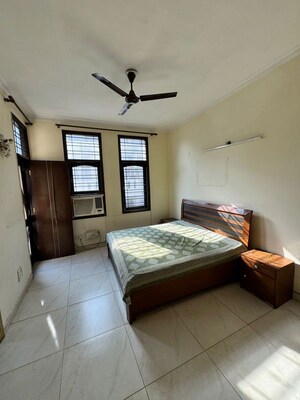 Bedroom in 2 BHK Builder Floor at Nehru Enclave – for Rent