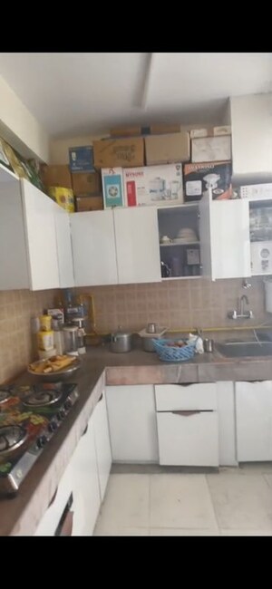 Kitchen in 3 BHK Apartment at MGI Gharaunda, Raj Nagar Extension – for Sale