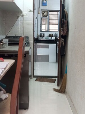 Kitchen in 2 BHK Apartment at Dhanraj Park Society, Wakad – for Rent