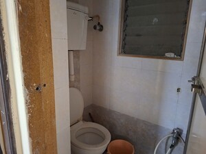 Bathroom in 1 BHK Apartment at SH Shubhangan, Nalasopara West – for Rent