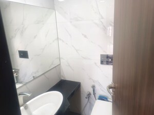 Bathroom in 2 BHK Apartment at Anmol Society, Marol – for Rent