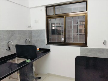 Kitchen in 1 BHK Apartment at Roshan Milestone, Tathawade – for Rent